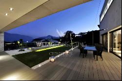 Lugano-Carona: extraordinary contemporary-style villa with indoor pool & lake view for sa