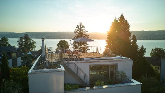 Designer villa with panoramic lake view.