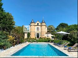 Turreted Petit Chateau with 6+ acres of land and heated swimming pool