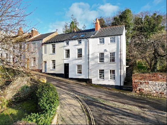 A handsome Grade II Listed terraced house in a sought-after Exeter setting