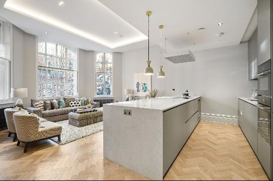 A stunning modern and recently refurbished two bedroom apartment set on one of Kensingtons