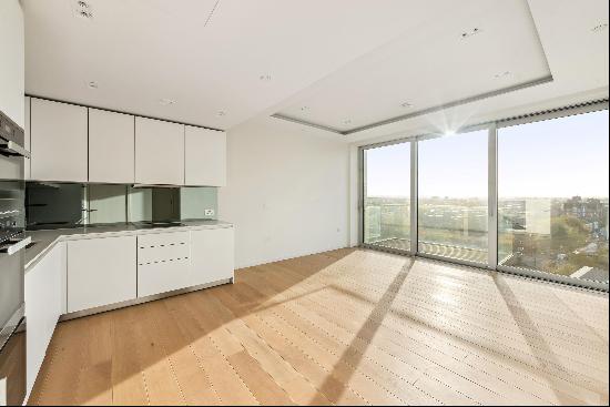 Lateral 2 bedroom apartment with study and roof terrace to rent in Lillie Square, SW6.