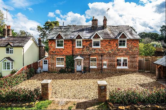 Set in the heart of the Surrey Hills, a handsome family home, beautifully presented throug