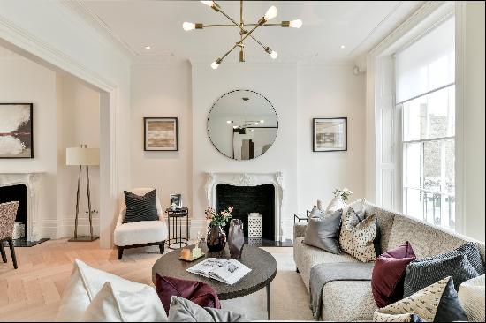 An immaculately refurbished three bedroom triplex apartment  in Ebury Street, Belgravia