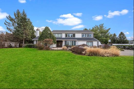 Welcome to this stunning contemporary colonial, nestled on a serene 1-acre cul-de-sac in t