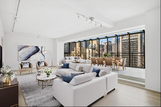 Welcome to 333 East 46th Street, Penthouse A - a stunning, newly renovated 2-bedroom, 2