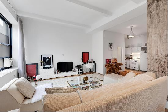 Welcome home to your glamorous quintessential Downtown prewar loft in the full service 