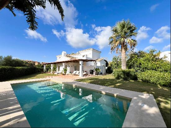 An exquisite villa in a gated community with panoramic views.