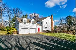 Light Filled Center Hall Colonial in Sought After Location