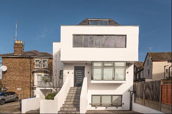 A three/four bedroom modern detached property located on Ridge Road, NW2.