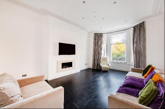 A contemporary maisonette with private garden on the famous Abbey Road, NW8.