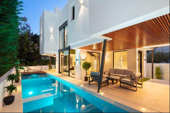 A contemporary villa with bright living spaces in a highly sought-after location.