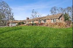 Stunning Ranch Style Home Nestled on Three Acre Property