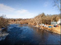 Beautifully redone home situated right on the Shetucket River