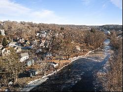 Beautifully redone home situated right on the Shetucket River