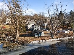 Beautifully redone home situated right on the Shetucket River