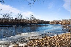 Beautifully redone home situated right on the Shetucket River