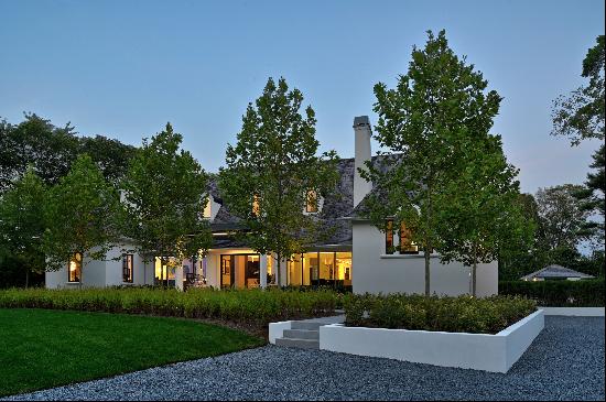 This magnificent world-class home is located in the estate section of East Hampton Village