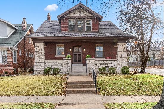 Stunning brick and stone craftsman home with wonderful details