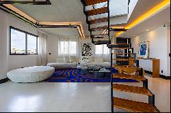 Contemporary duplex penthouse with panoramic views and gourmet space