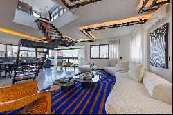 Contemporary duplex penthouse with panoramic views and gourmet space