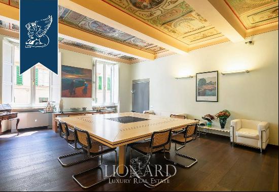 Luxurious renovated apartment with terraces for sale in Florence's famous San Frediano dis