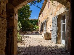 19th-century farmhouse with panoramic views and swimming pool.