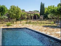 19th-century farmhouse with panoramic views and swimming pool.