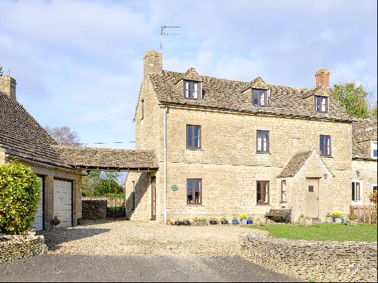 A four bedroom cottage with off street parking and private gardens in the desirable villag