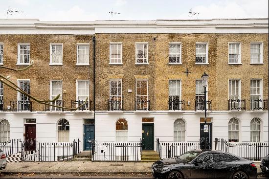 A beautiful home for sale on a prestigious Chelsea garden square.