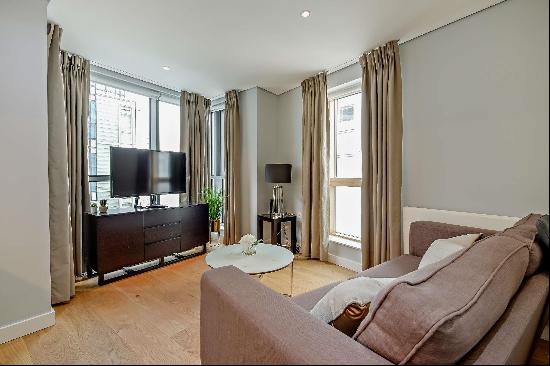 Two bedroom apartment to rent in Merchant Square, Paddington, London W2.