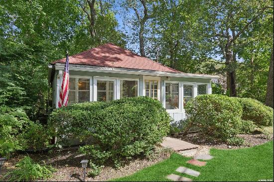 An Enchanting Cottage Tucked Away in a Historic Private Wooded Community in the Heart of J