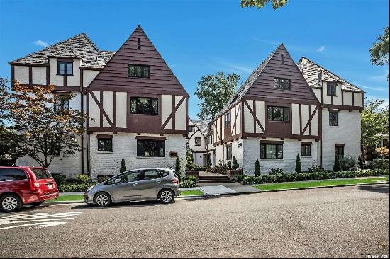 Beautifully Renovated 2-Family Tudor - Prime Location Across from Bowne Park! This beautif