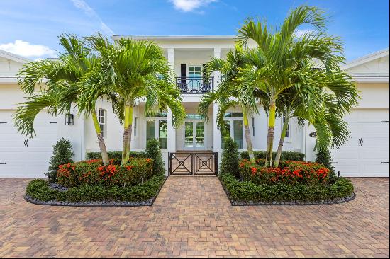 Welcome to 8120 SE Old Plantation Circle located in the highly sought after Jupiter commun