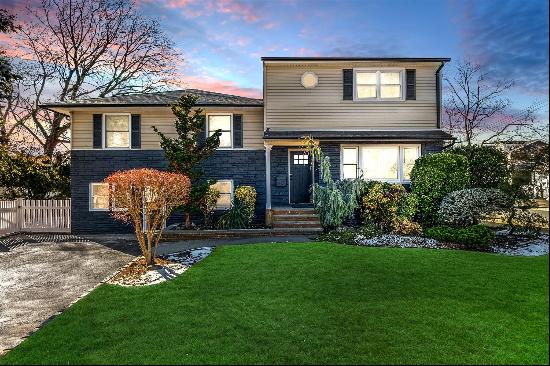 Welcome Home to your newly renovated Dream Home nestled South of Merrick Road in the heart