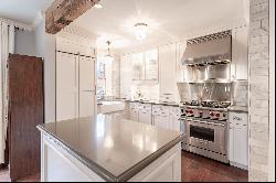 "IMPECCABLY RENOVATED SPANISH STYLE TOWNHOUSE"