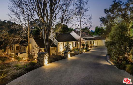 Experience timeless elegance reimagined in this 1938 Gerard Colcord estate, where Bel Air 