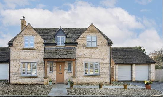 Set at the end of a private drive in a village location, a beautifully built Cotswold ston