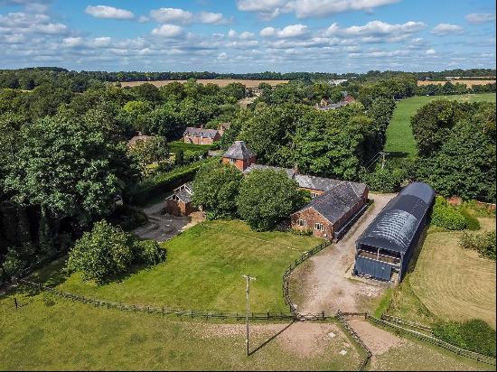 A unique, historic house with equestrian facilities in a village setting close to Winchest