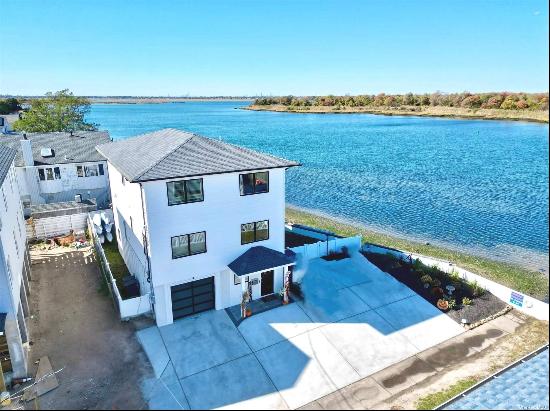 Welcome to 14 Pershing Place, A Stunning Brand-New Construction Waterfront Home Secluded o