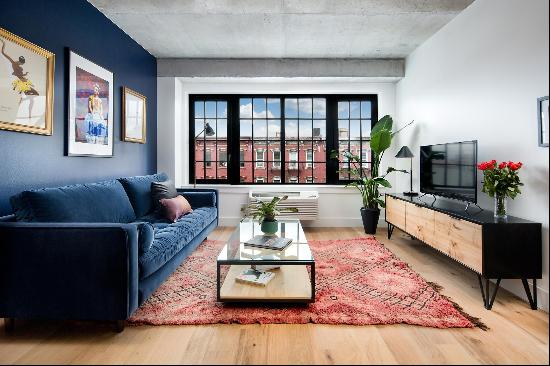   Enjoy industrial-chic oversized windows, great closet space, and an in-unit Bo