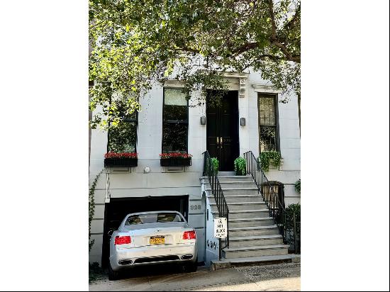 This modern single-family townhouse with private garage at 328 East 69th Street in Leno