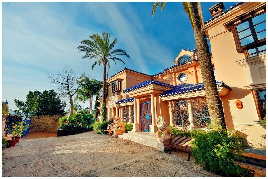 A grand and spacious villa with double-height ceilings.