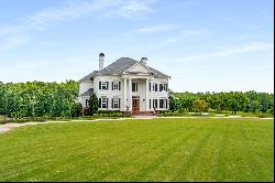 Spectacular Estate Beautifully Sited on 4+/- Private Acres with Lake Views