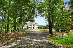 Spectacular Estate Beautifully Sited on 4+/- Private Acres with Lake Views