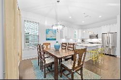 Coastal Elegance With First-Floor Living In Gated Community  