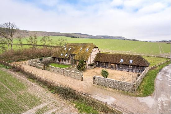 A high quality detached barn conversion in an idyllic setting within the South Downs