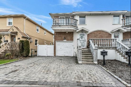 Welcome to this beautifully maintained two-family home in the heart of Bay Terrace. This p