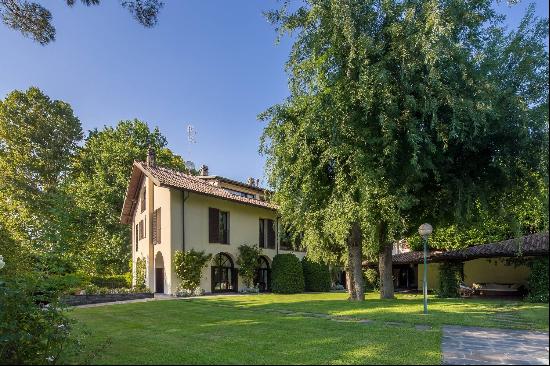 Elegant villa with pool and garden on the banks of the Ticino