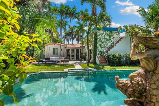 Experience the epitome of Miami Beach luxury in this stylish 3-bed, 3-bath home located in